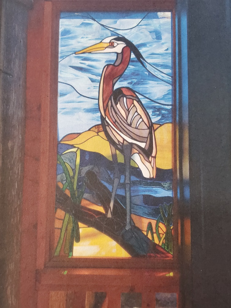 Great Blue Heron standing on a branch Stained Glass